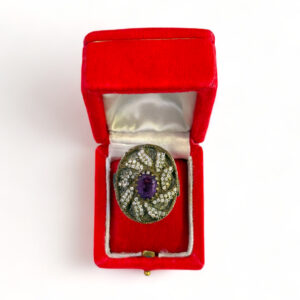 Anello con strass e pietra viola